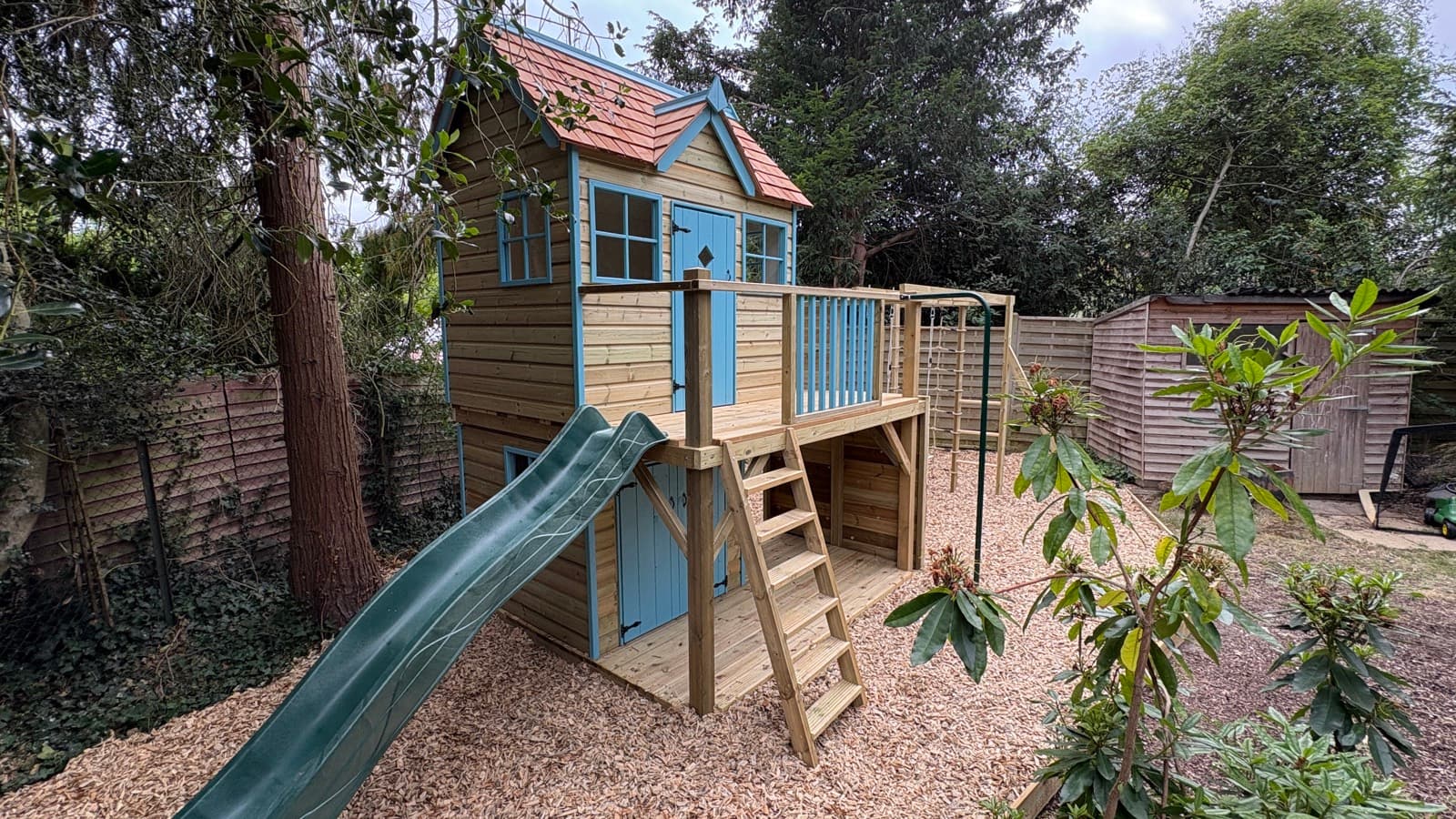 An Otter Mega: the Otter cottage raised over a lower deck and den with double doors and two windows beneath